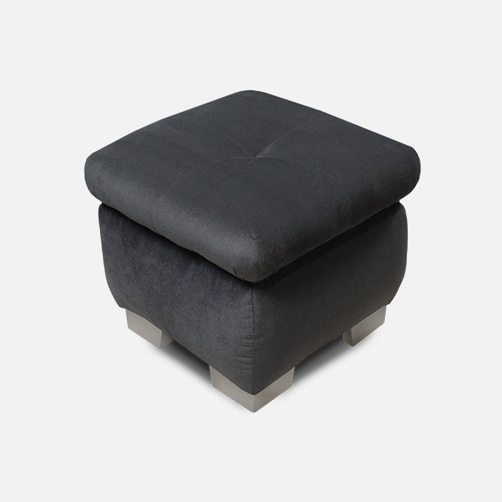 stilingas tamsiai pilkas pufikas prie minksto kampo 